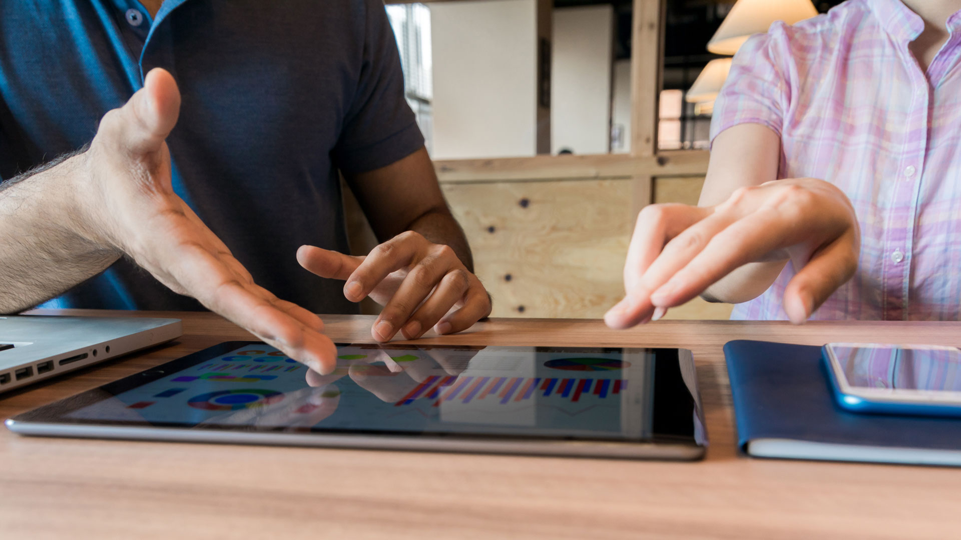 Blue Calmac Group supply chain and procurement experts collaborating in a strategic team meeting, optimizing logistics, supplier management, and operational efficiency.