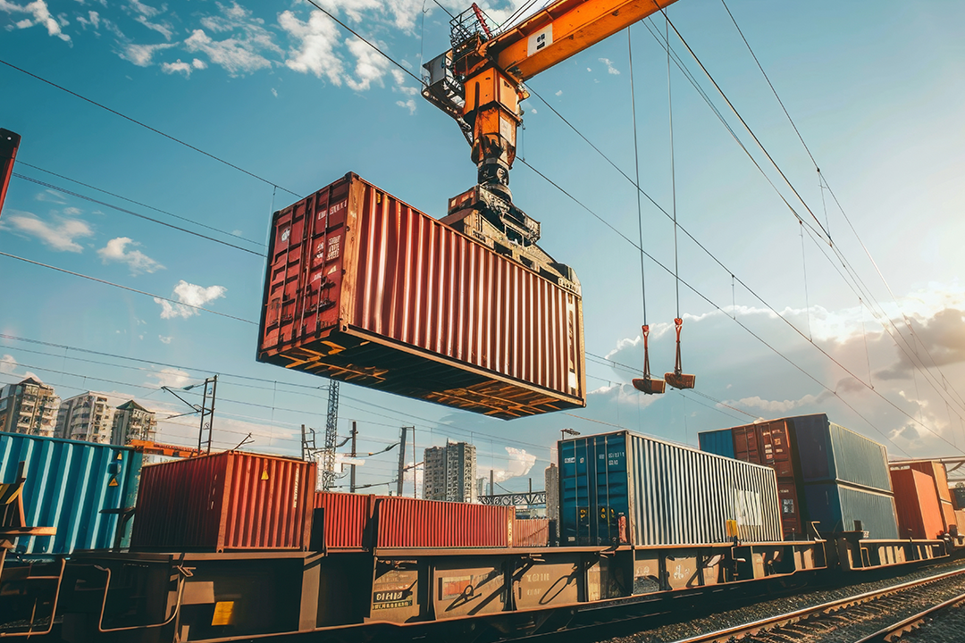 Shipping containers stacked at an international cargo port, symbolizing the tariff impact on supply chain logistics and global freight movement