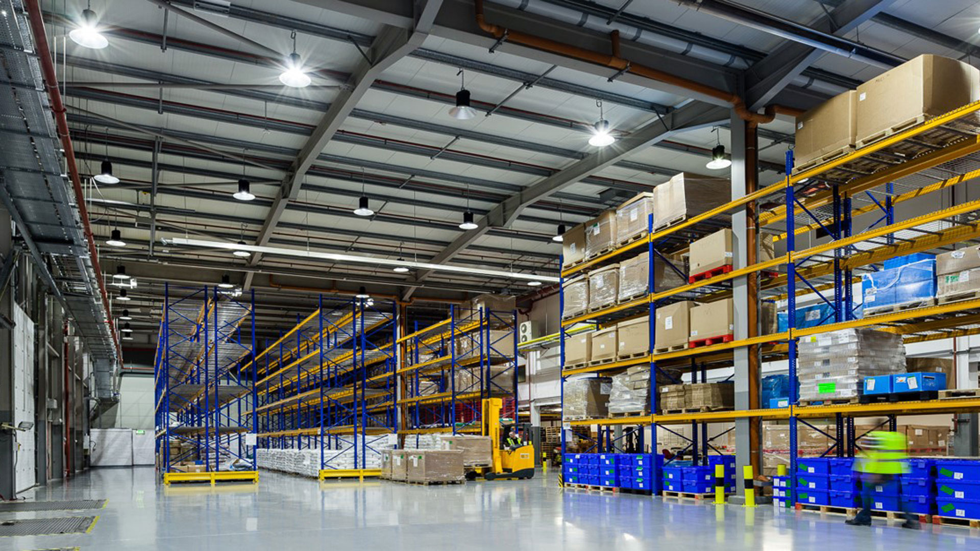 Modern warehouse operations showcasing Blue Calmac Group’s Logistics and Supply Chain Managed Services, ensuring efficient inventory and distribution management.